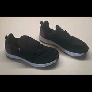 Crazy 8 boys or girls pull on athletic shoes.